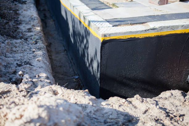 Professional Waterproofing technician working in Villanova, PA